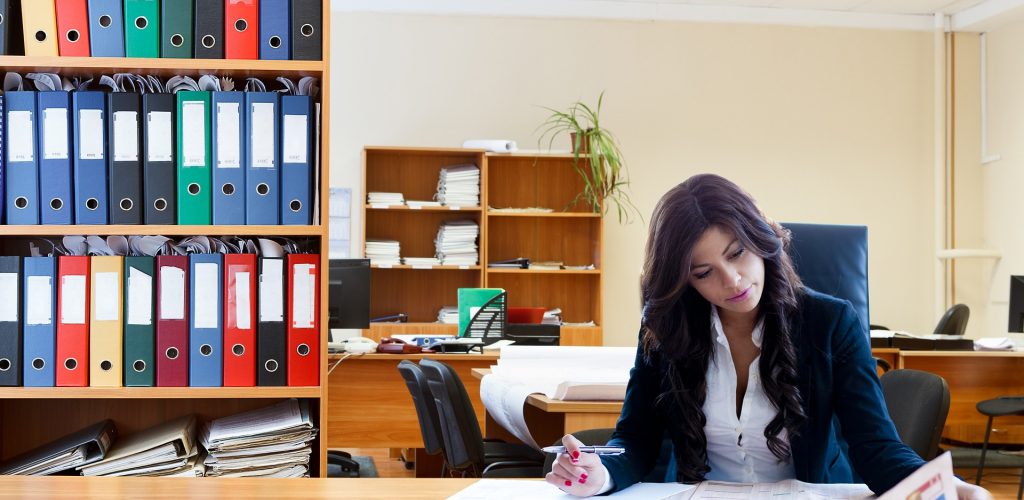 woman sitting at office desk
