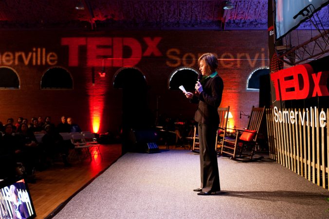 Woman giving a TED talk